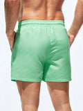 Solid Colored Swim Trunks